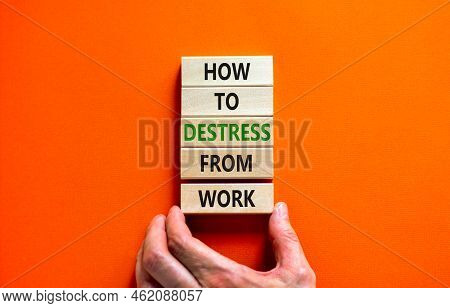 Destress From Work Symbol. Concept Words How To Destress From Work On Wooden Blocks. Doctor Hand. Be