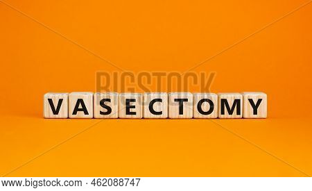 Vasectomy Symbol. Concept Words Vasectomy On Wooden Blocks. Beautiful Orange Table Orange Background