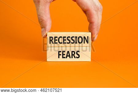 Recession Fears Symbol. Concept Words Recession Fears On Wooden Blocks On A Beautiful Orange Table O