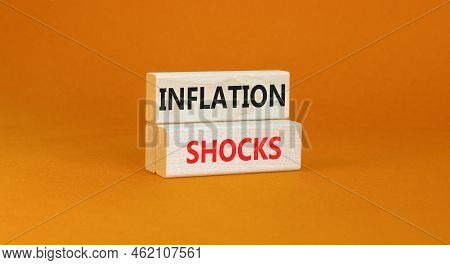 Inflation Shocks Symbol. Concept Words Inflation Shocks On Wooden Blocks. Beautiful Orange Table Ora