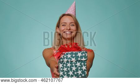 Positive Smiling Blonde Woman Presenting Birthday Gift Box Stretches Out Hands, Offer Wrapped Presen