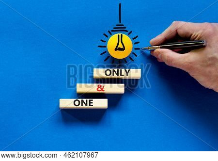 One And Only Symbol. Concept Words One And Only On Wooden Blocks On A Beautiful Blue Table Blue Back