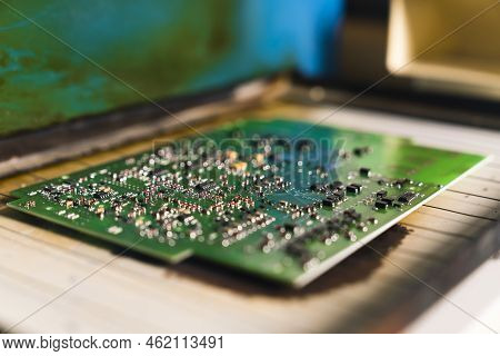 Solder Reflow Furnace Attaching Many Tiny Electrical Components To Their Contact Pads. Modern Electr