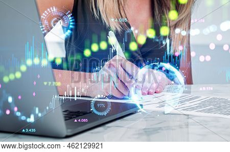 Businesswoman Sign A Paper Contract, Laptop On Desk. Double Exposure Forex Analysis, Stock Market Ca