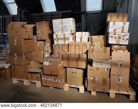 Boxes With Humanitarian Aid For Ukraine In Volunteer Centre Warehouse. Dnipro, Ukraine - 06.30.2022