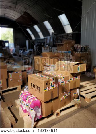 Boxes With Humanitarian Aid For Ukraine In Volunteer Centre Warehouse. Dnipro, Ukraine - 06.30.2022
