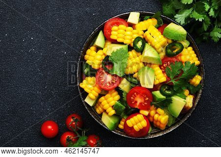 Tex-mex Spicy Salad With Corn, Avocado, Jalapeno Peppers, Cherry Tomatoes And Cilantro. Black Stone 