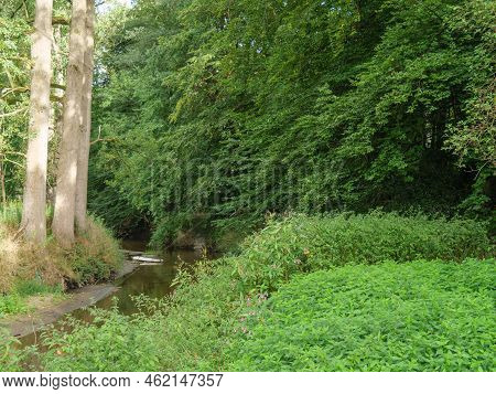 hiking at the berkel river near vreden in germany