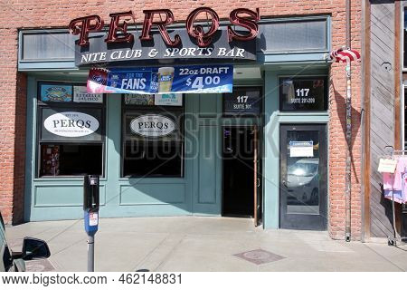 Huntington Beach, CA. - USA - September 19, 2022:  PERQS Night Club and Sports Bar in Huntington Beach California on Main Street. A world famous Huntington Beach Local Bar and Pub. 
