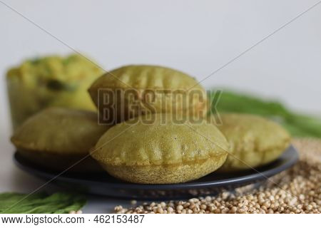 Jowar Palak Puri Or Sorghum Spinach Fried Flat Bread. Fried Bread Made Of Sorghum Millet Flour And P