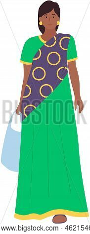 Indian Girl In An Ethnic Traditional Costume, Sari Holds Paper Bag In Her Hands, Stands Straight To 