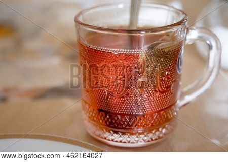 Close Up Glass Cup Of Tea On A Table