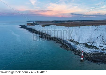 Beautiful Summer Sunrise Landscape Image Of Beachy Head Lighthouse In South Downs National Park In E