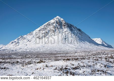 Stunning Iconic Landscape Winter Image Of Stob Dearg Buachaille Etive Mor Mountain In Scottish Highl