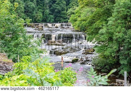 Aysgarth Falls Are A Three Levels One Mile Stretch Waterfalls In Yorkshire Dales National Park, Rive