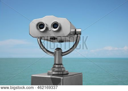 Metal Tower Viewer Installed Near Sea. Mounted Binoculars