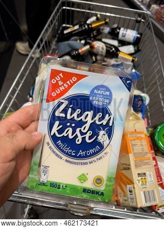 Frankfurt, Germany - Sep 17, 2022: Pov Male Hand Holding Ziegen Kase Goat Cheese Gut Und Gunstig By 