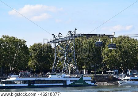 Koblenz, Germany - 09 12 2022:seilbahn Koblenz With A Passenger Ship In Front