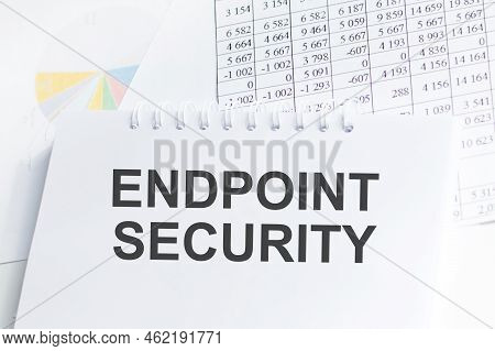 Text Endpoint Security On Brown Paper Notepad In Office. Business Concept