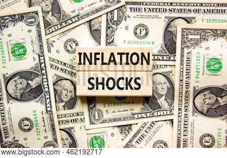 Inflation Shocks Symbol. Concept Words Inflation Shocks On Wooden Blocks. Beautiful Background From 