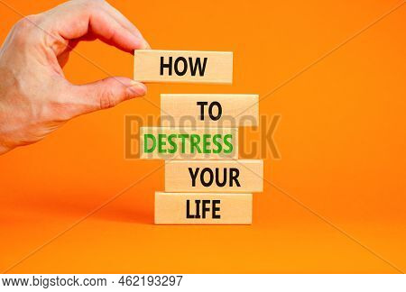 Destress Your Life Symbol. Concept Words How To Destress Your Life On Wooden Blocks. Doctor Hand. Be