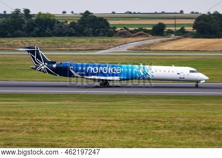 Vienna, Austria - July 22, 2016: Nordica Passenger Plane At Airport. Schedule Flight Travel. Aviatio