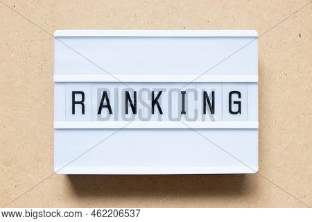 Lightbox With Word Ranking On Wood Background