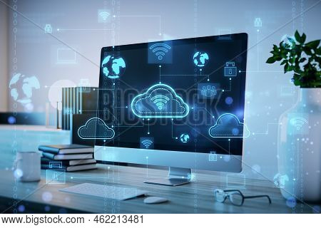 Close Up Of Creative Designer Workplace With Computer Screen And Digital Cloud Computing Hologram On