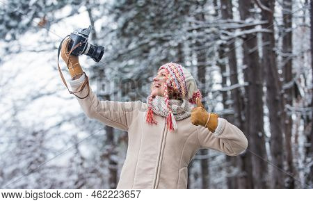 Girl With Vintage Camera In Snowy Nature. Traveling Concept. Capturing Winter. Take Stunning Winter 