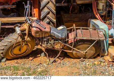 Old Chain Driven Motor Cycle In Junkyard