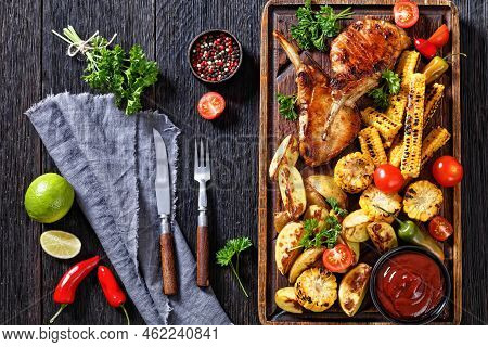 Bbq Tomahawk Pork Chops, Bone-in Ribeye With Grilled Corn Disks And Corn Ribs, Wedges Potatoes, Fres
