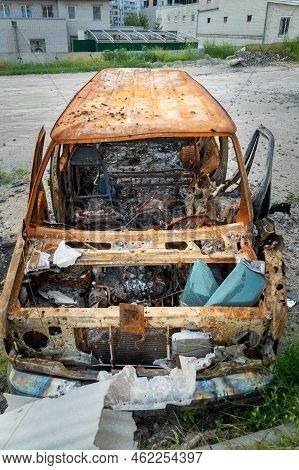 Damaged And Destroyed Civilian Car With Shrapnel Holes From Russian Missile In A War Zone In Kharkiv