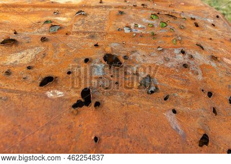 Burnt , Damaged And Destroyed Civilian Car With Shrapnel Holes From Russian Missile In A War Zone In