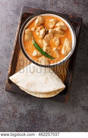 Kukul Mas Maluwa Sri Lankan Chicken Curry Closeup In The Bowl On The Table. Vertical Top View From A