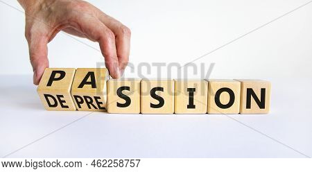 Passion Or Depression Symbol. Businessman Turns Wooden Cubes And Changes The Word Depression To Pass