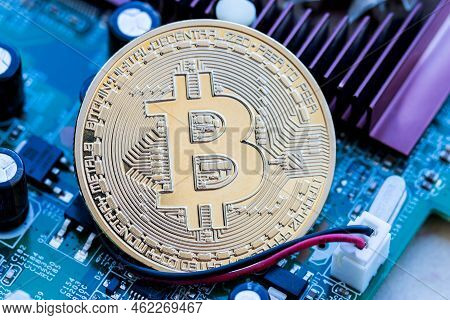 Crypto Currency Or Bitcoin Crypto On Mainboard Computer. Concept Of Financial Currency Digital Or In