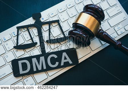 Plate With Dmca Digital Millennium Copyright Act Sign, Gavel And Keyboard.