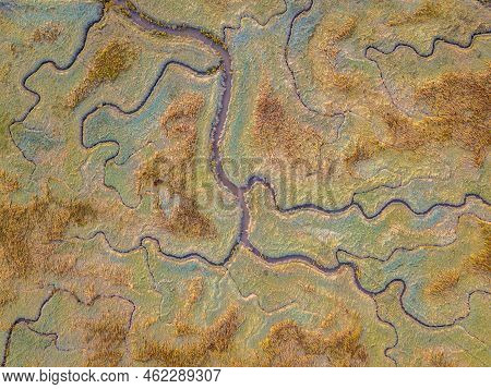 Aerial Top Down View Of Tidal Marshland With Natural Meandering Drainage System In Verdronken Land V
