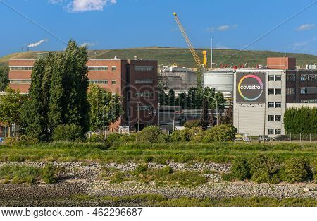 Antwerpen, Flanders, Belgium - July 10, 2022: Industry Along Scheldt River. Covestro Office Building