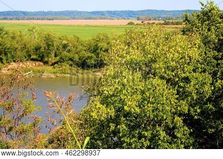 Deciduous Trees On A Hillside Bluff Overlooking The Missouri River Taken At A Riparian Woodland In A