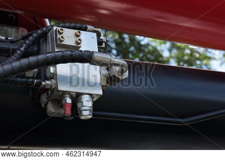 Crane Hydraulic Valve. Close-up View Of Hydraulic Oil Valve Or Crane Gear-driven Check Valve With Co
