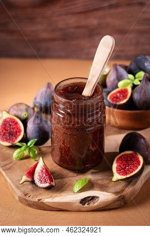 Autumn Preserves From Local Produce, Fig Jam Or Fig Marmalade On Wooden Board With Fresh, Ripe Figs,