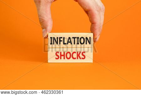 Inflation Shocks Symbol. Concept Words Inflation Shocks On Wooden Blocks. Beautiful Orange Table Ora