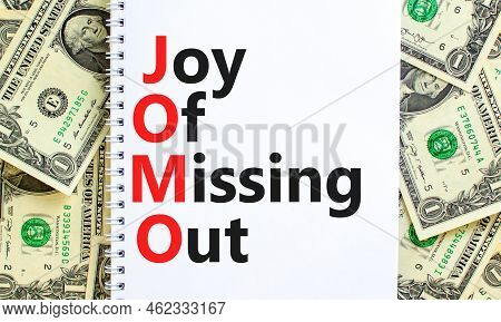Jomo Joy Of Missing Out Symbol. Concept Words Jomo Joy Of Missing Out On Note On Beautiful White Bac