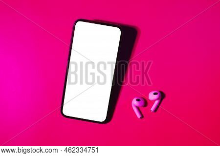 Mobile Phone Mockup In Pink And Purple Light.design Template For Concept Design. Modern Communicatio