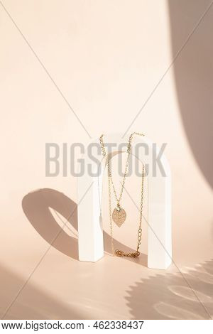 Costume Jewelry On A Monochromatic Background In The Interior