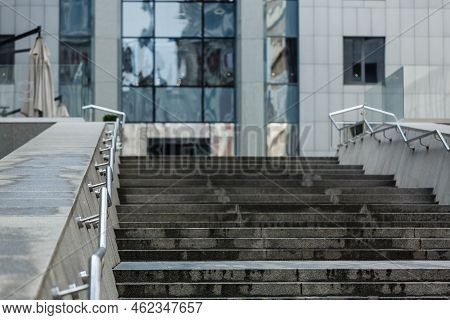Entrance To Modern Office Building. The Front Door To Scyscaper. Stairs And Glass Door Of Commercial