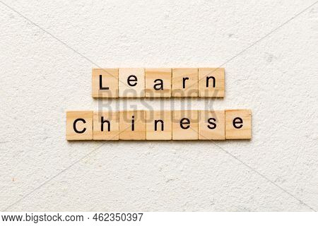 Learn Chinese Word Written On Wood Block. Learn Chinese Text On Table, Concept.