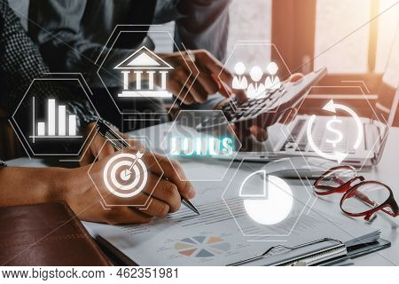 Bond Finance Banking Technology Concept, Usiness Team Analyzing Income Charts And Graphs With Bond I
