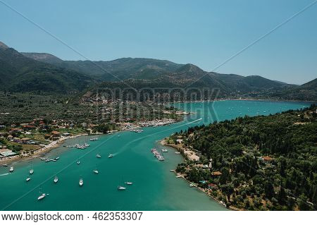 Popular Tourist Destination. Bay With Boats On Lefkada Island. Nydri Village.